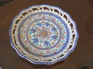 Multicoloured pierced Flora Gouda Holland glazed pottery plate.