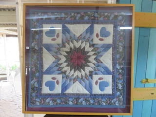Framed Amish quilt