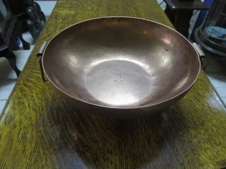 Small vintage copper dish with handles