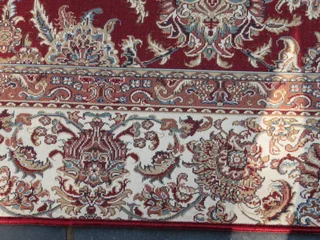 A Persian design Kelim carpet.
