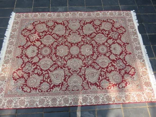A Persian design Kelim carpet.