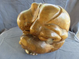 Carved wooden weeping buddha