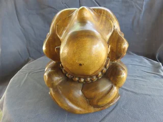 Carved wooden weeping buddha