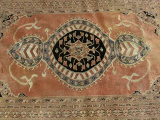 A hand knotted Jaipuri rug