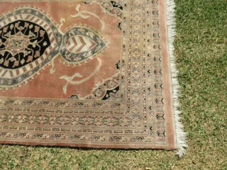 A hand knotted Jaipuri rug