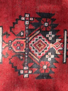 A Persian hand knotted Kordi rug.