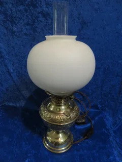 Victorian embossed brass electrified Millers paraffin lamp.