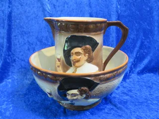 Falcon Ware &#34;Cavalier&#34; hand painted jug and bowl.