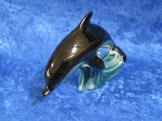 Poole pottery dolphin.
