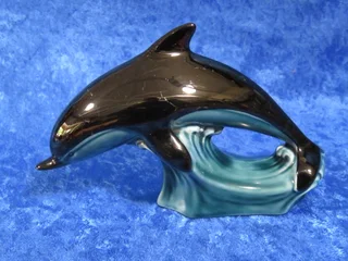 Poole pottery dolphin.