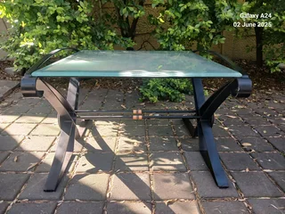 Wrought iron and opaque glass side table