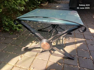 Wrought iron and opaque glass side table