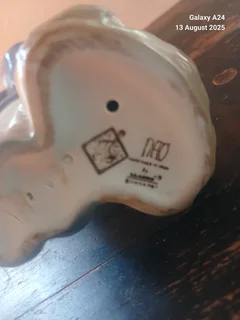 Nao figurine of a boy holding a bag #1036