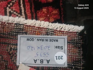 A Persian hand knotted Beluchi rug