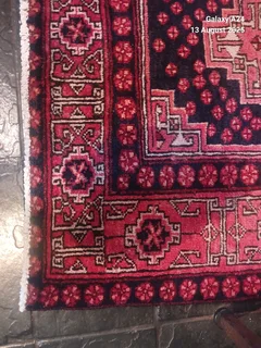 A Persian hand knotted Beluchi rug