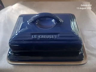 A Le Creuset azure blue butter dish