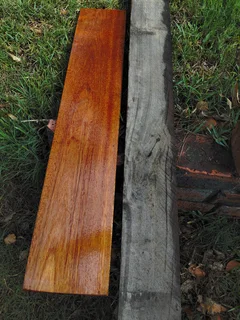 planks wooden , rough off saw , grey in color,  dry