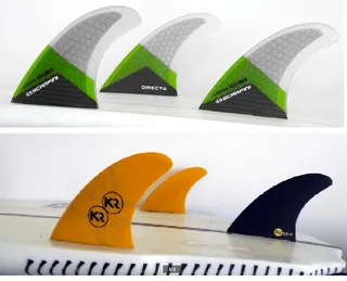 Surfboard fins - Scarfini HX4 (L) and KR Epoxy Fibrelight (M) (FCS)