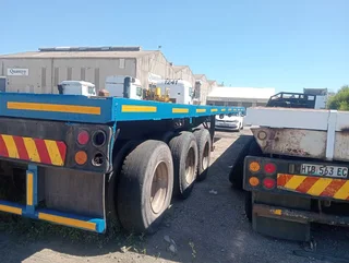 Flat deck triaxle trailer for sale