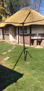 Thatched bachelor cottage