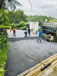 TAR SURFACING DRIVEWAYS