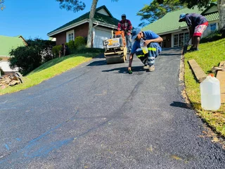 TAR SURFACING DRIVEWAYS