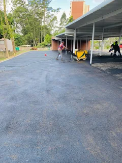TAR SURFACING DRIVEWAYS