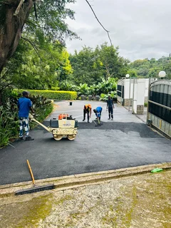 TAR SURFACING DRIVEWAYS
