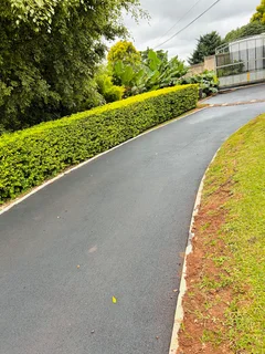 TAR SURFACING DRIVEWAYS