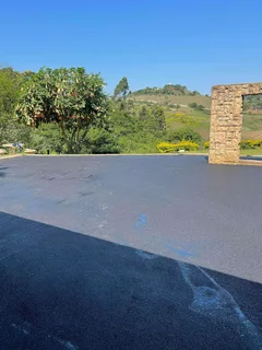 TAR DRIVEWAYS RETAINING WALLS