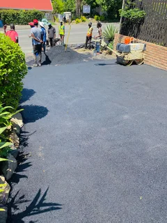 TAR DRIVEWAYS RETAINING WALLS