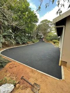 TAR DRIVEWAYS RETAINING WALLS