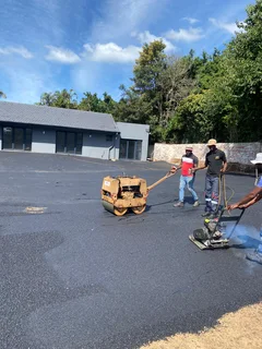 TAR DRIVEWAYS AND RETAINING WALLS