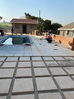 TAR DRIVEWAYS AND RETAINING WALLS