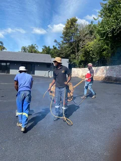 TAR DRIVEWAYS AND RETAINING WALLS