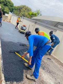 TAR DRIVEWAYS AND RETAINING WALLS
