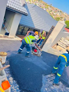 TAR DRIVEWAYS AND RETAINING WALLS