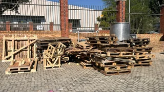 Collections of wooden and plastic pallets