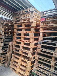 Wooden pallets in stock contact us