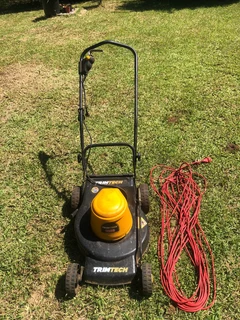 Trimtech lawn mower with cable