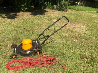 Trimtech lawn mower with cable
