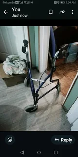 Walker with brakes good condition 700