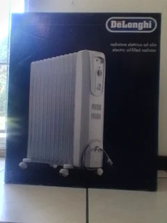 DeLonghi heater (brand new in the box)