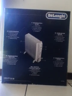 DeLonghi heater (brand new in the box)