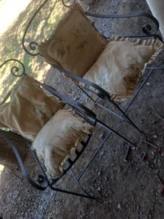 2 Metal chairs with 2 cushions each