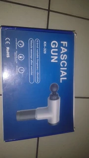 Deep tissue massage gun with 4 changeable heads black and silver