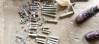 Assorted hot dip galvanised bolts, nuts, washers, channel iron, flat bar, etc.Safety harness