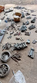 Assorted hot dip galvanised bolts, nuts, washers, channel iron, flat bar, etc.Safety harness