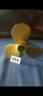 Brass propeller pen holder.