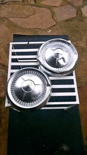 1957 chevy dog dish hub caps.